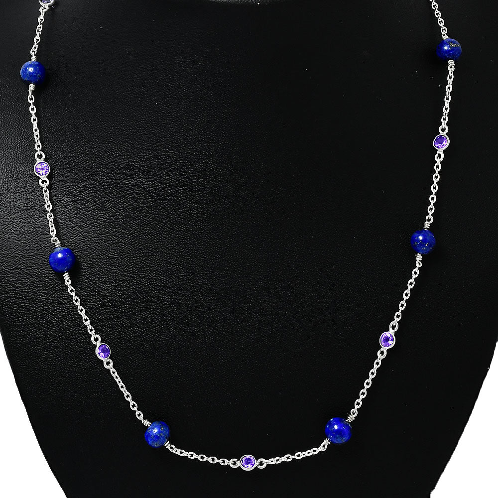 Amethyst version on a black display, blue lapis beads alternating with small purple stones