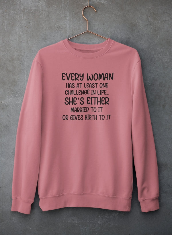 Mauve crewneck sweatshirt on a copper hanger against concrete, four-line joke in black.