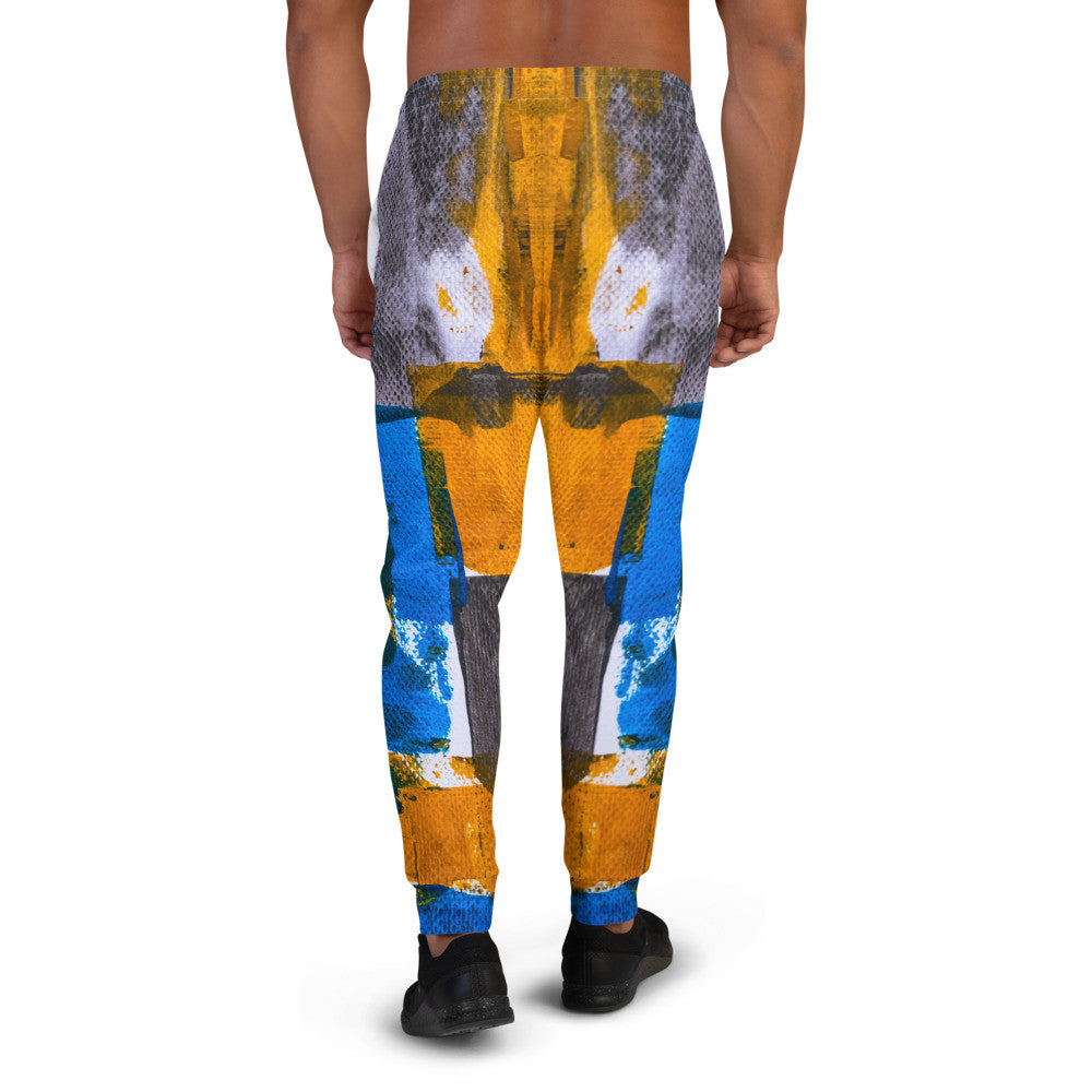 Men's joggers printed in blue, yellow and white blocks, with cuffed ankles.