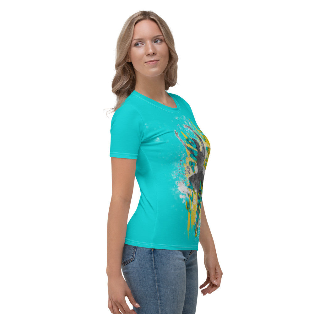 Fly And Shine women's jersey tee, turquoise ground with a leaping figure and yellow splashes.