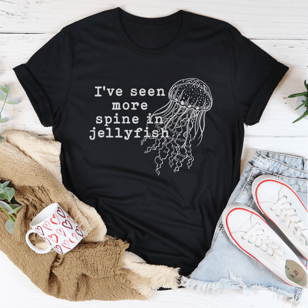 Pink cotton T-shirt laid flat, jellyfish spine graphic printed on the front.