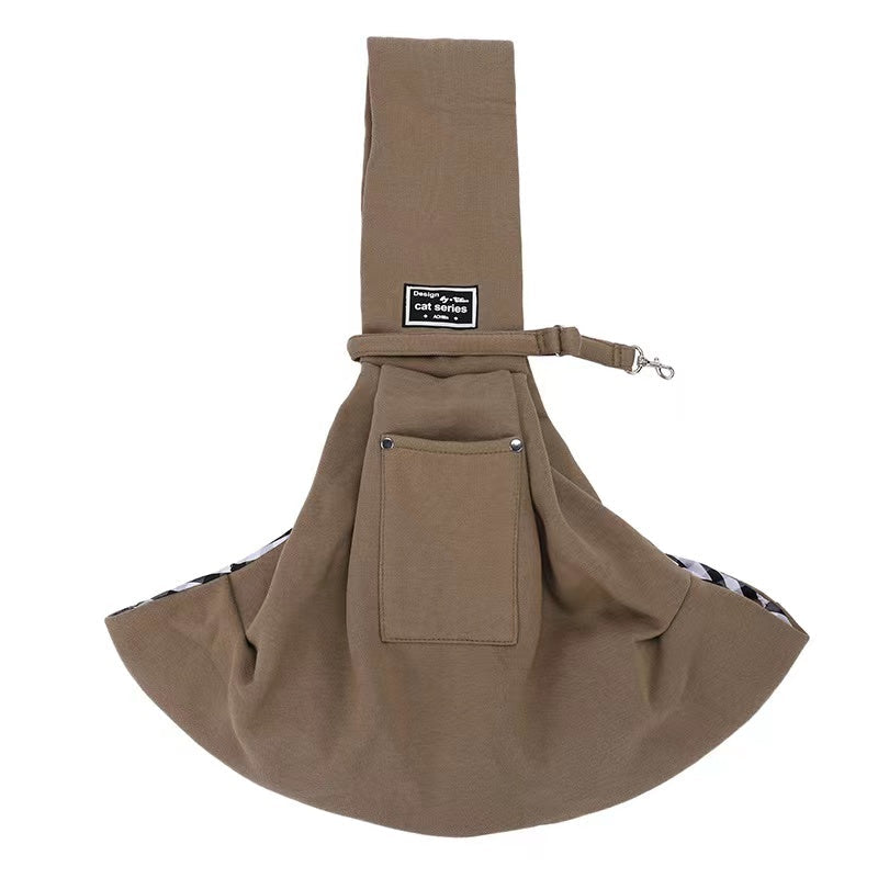 Khaki pet sling carrier seen from the front with the outer pocket.