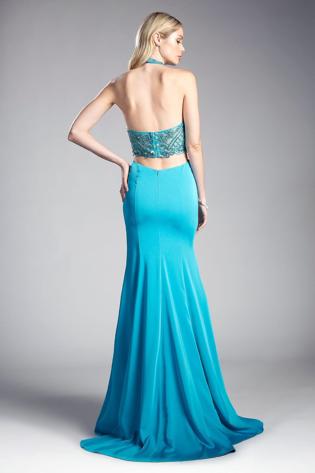 Stretch jersey gown, sleeveless, with a halter neck and side cut-outs.