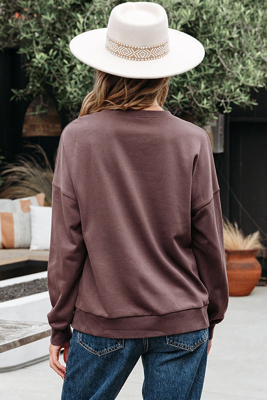 Back view of the brown crewneck sweatshirt