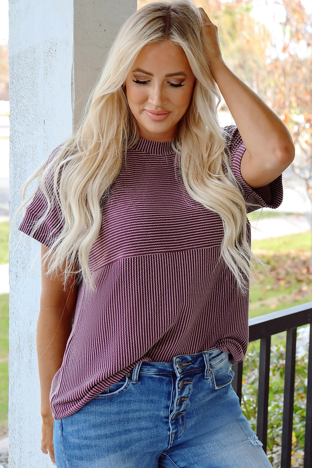 Mauve ribbed tee, model with a hand in her hair