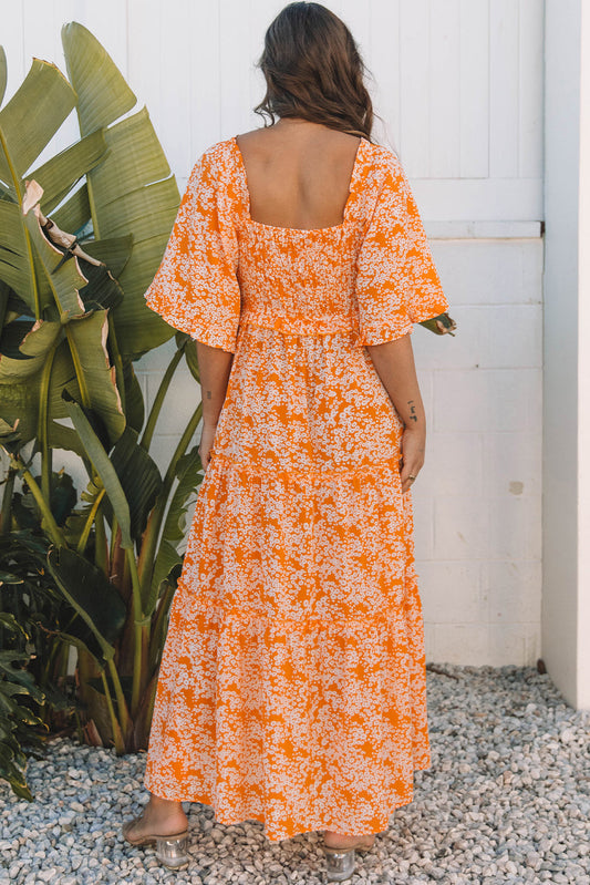 Back of the orange floral maxi dress showing the smocked square back