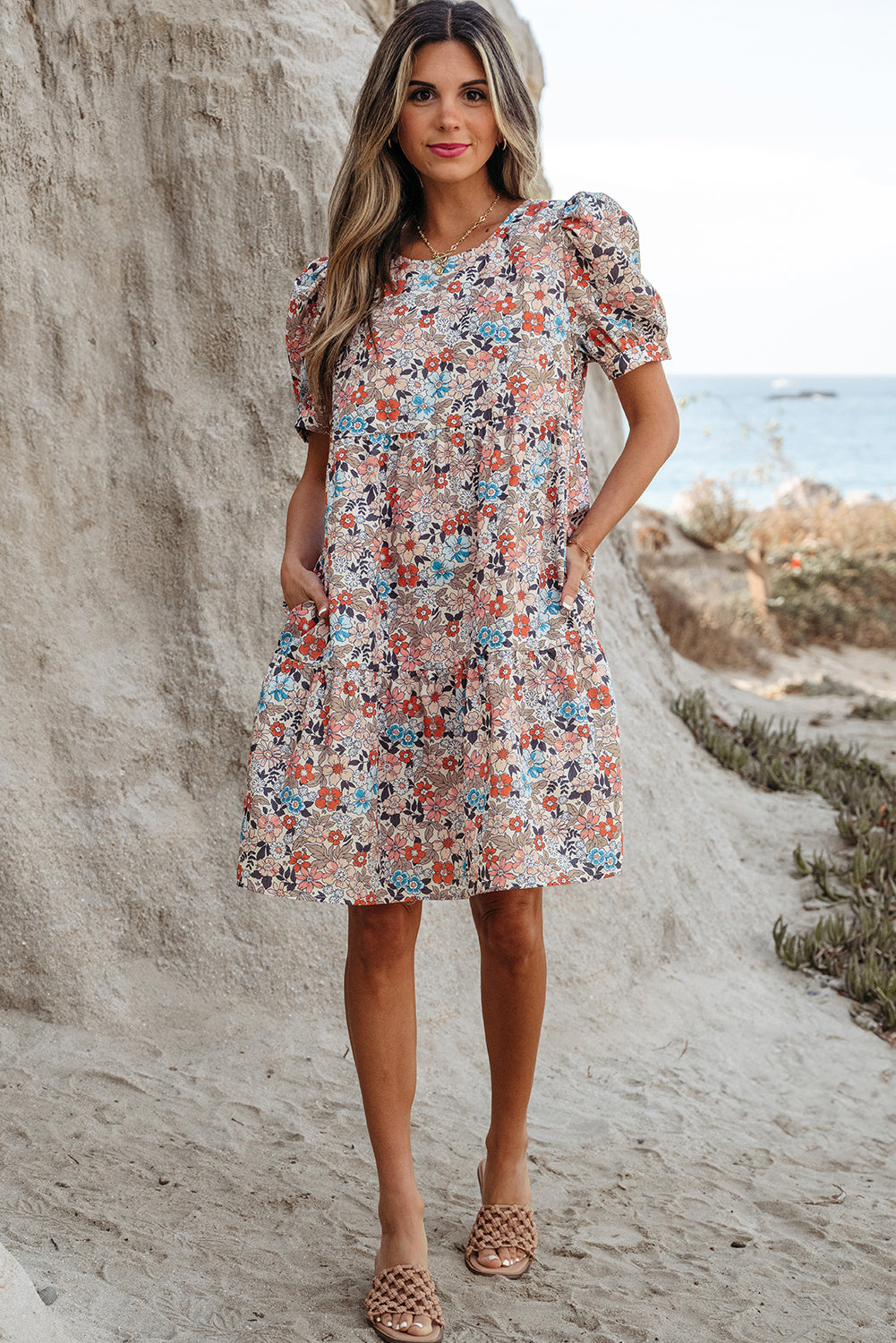 Full length view of the apricot floral mini dress