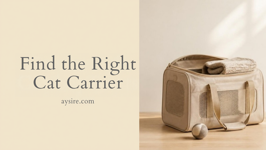 Find the Right Cat Carrier. A beige soft-sided pet carrier with a knit blanket and a felt ball toy on a wood floor.