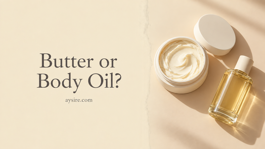 Butter or Body Oil? An open jar of body butter and a clear bottle of golden oil on a warm cream background.