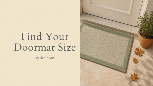 Find Your Doormat Size. A sage doormat in front of a cream door with a potted plant and autumn leaves on a stone porch.