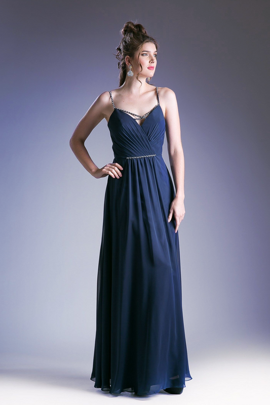 Elegant V-neck evening gown with spaghetti straps and beaded waistline by Tux-USA, featuring a flowing fabric design.