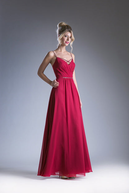 Burgundy V-neck evening gown with spaghetti straps and a beaded waistband.