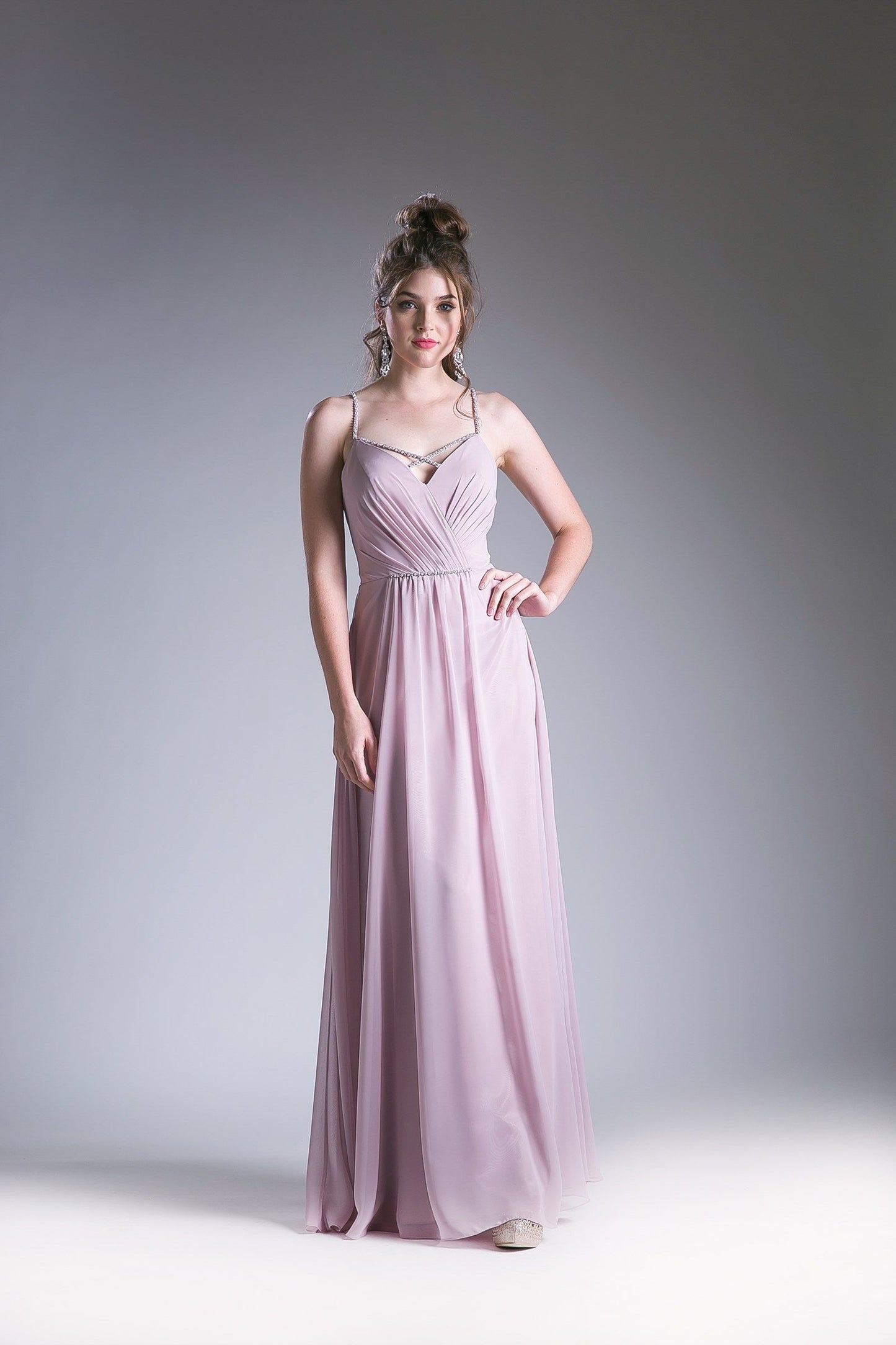 Marble V-neck evening gown with spaghetti straps and a beaded waistband.