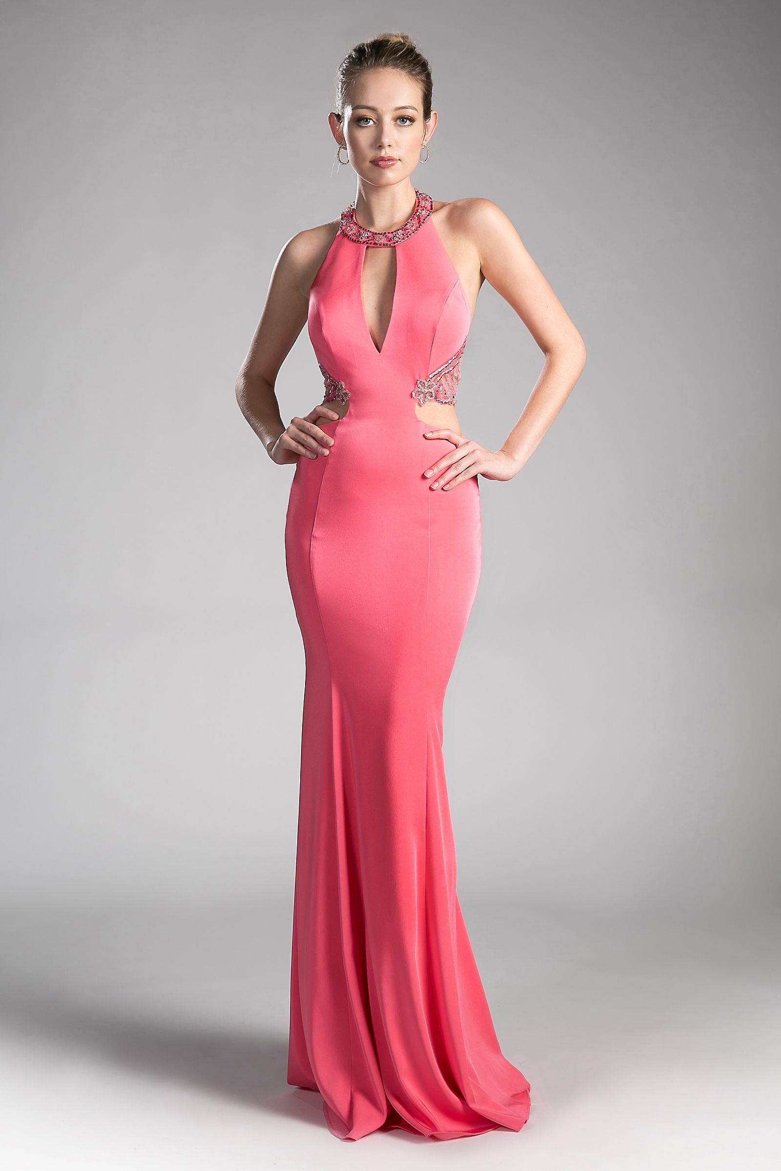 Stretch jersey gown with a halter neckline and a long fitted skirt.