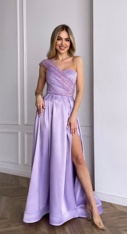 Lavender corset dress with one-shoulder sequin mesh draping and pleated satin maxi skirt by GLOWSYOU