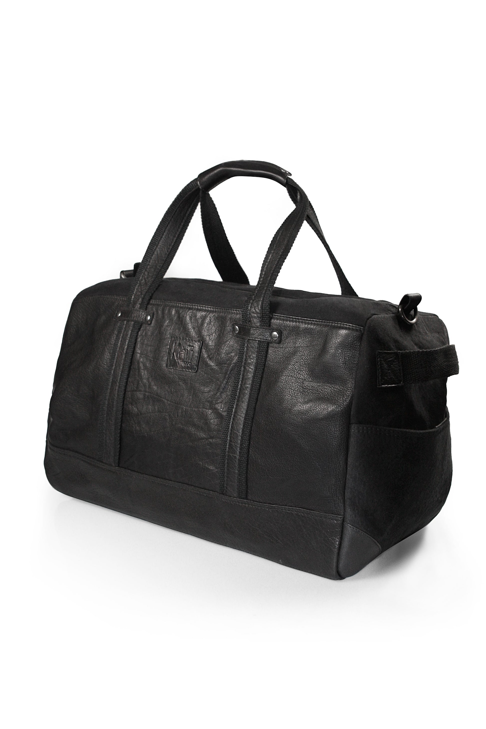 K0024AB | Canvas/Vera Leather Travel Duffle Bag, full-grain, ruffled - Black Color. Nickel Antique Accessories, Zipper Closure. Dimensions: 48 x 31 x 22 cm - Packaging: Tnt bag-0
