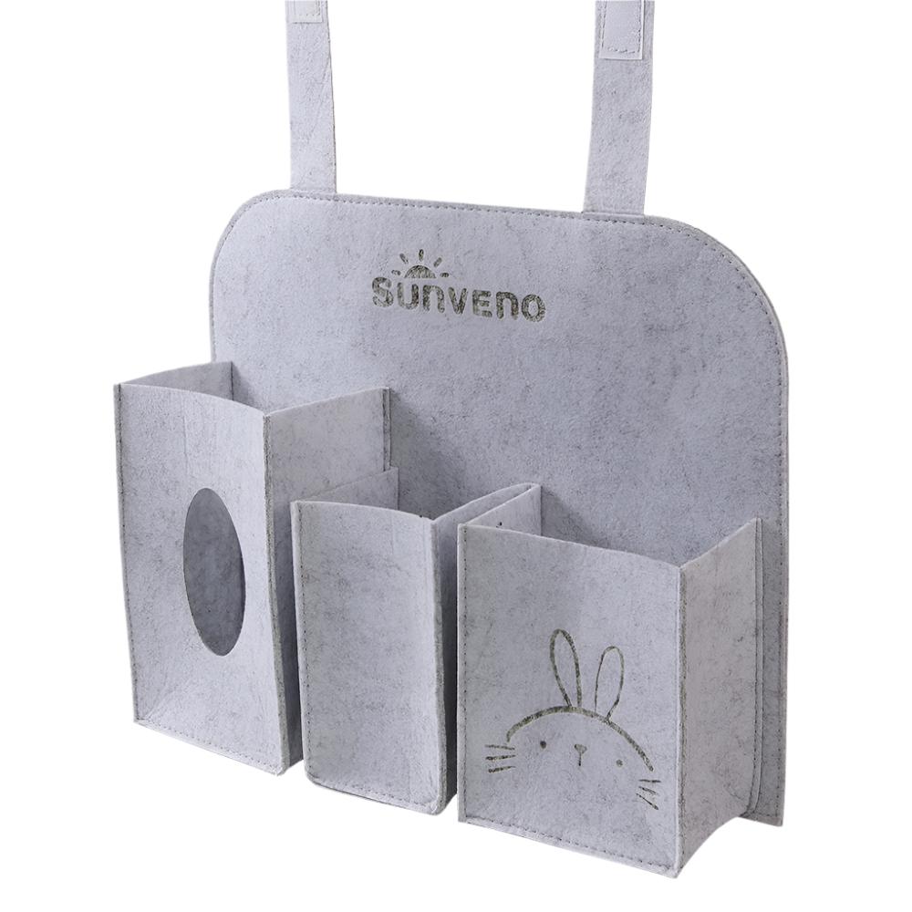 Sunveno baby car seat organizer with three pockets, showing a compact, easy-to-access storage solution for car travel essentials.
