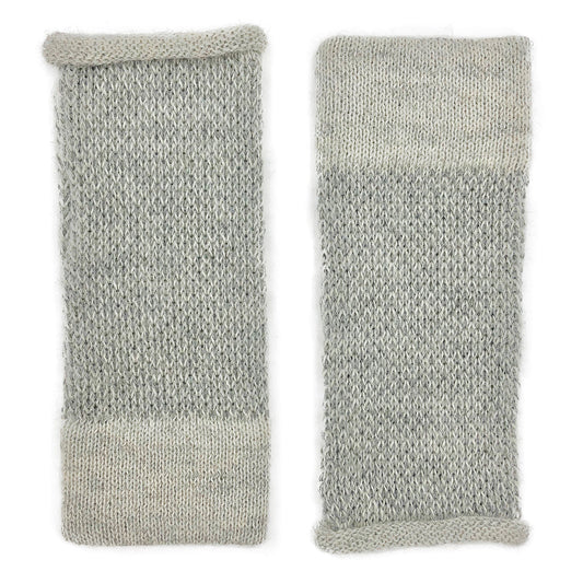 Pair of gray two-tone alpaca fingerless gloves laid flat, speckled knit with a solid pale gray band at the cuff