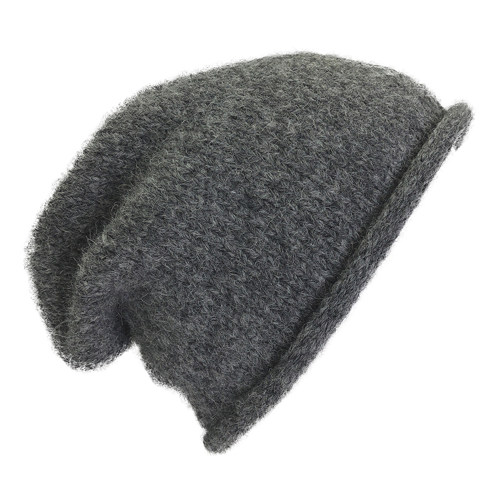 Charcoal gray slouchy beanie with a rolled brim, shown from the side on white