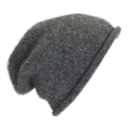 Charcoal gray slouchy beanie with a rolled brim, shown from the side on white