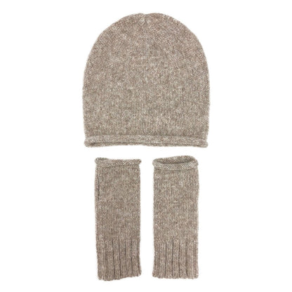 Beige slouchy beanie above a pair of matching beige fingerless gloves, laid flat on white