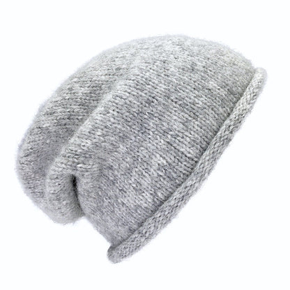 Heather gray slouchy beanie with a rolled brim, shown from the side on white