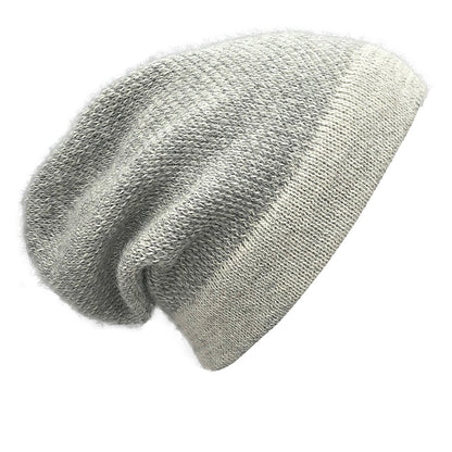 Gray alpaca hat seen from the side, a two-tone speckled knit with a solid light gray brim band