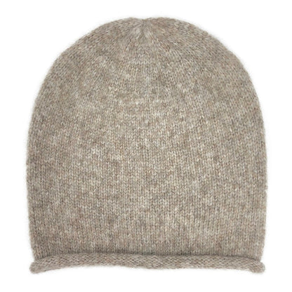 Beige baby alpaca blend beanie laid flat from the front, showing its soft heathered knit