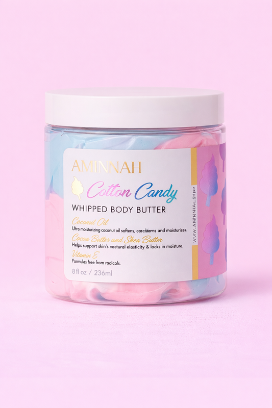 Jar of Cotton Candy whipped body butter with the label facing forward on pale pink.