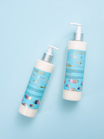 Two blue pump bottles of gentle cleanser standing on a blue background.
