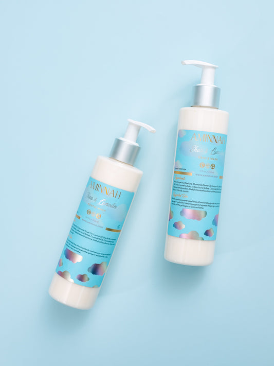 Two blue pump bottles of gentle cleanser standing on a blue background.