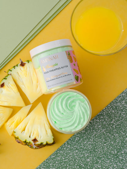 Two jars on a green and yellow background with pineapple slices and a glass of juice.