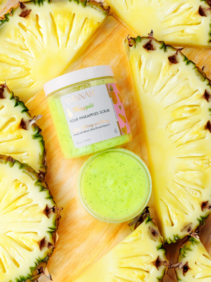 Dropper bottle and open jar arranged on a bed of pineapple slices.