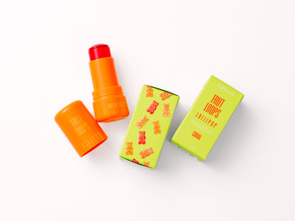 Three tints and their cartons lying together on a white surface.