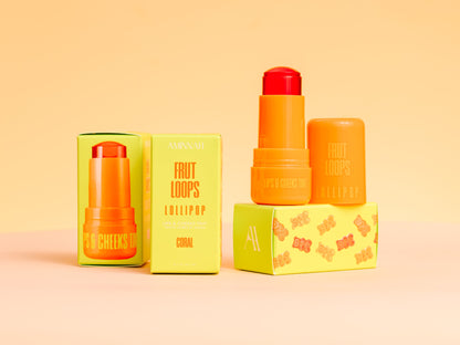 Tints and cartons standing upright on a peach background.
