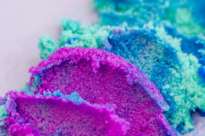 Close view of the blue and purple sugar scrub texture.