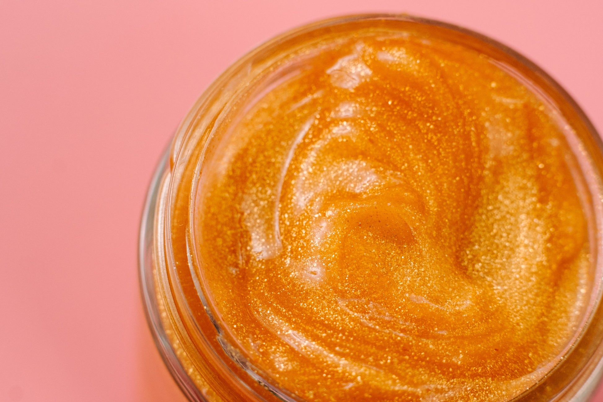 Close view of the gold jelly texture filling the frame.
