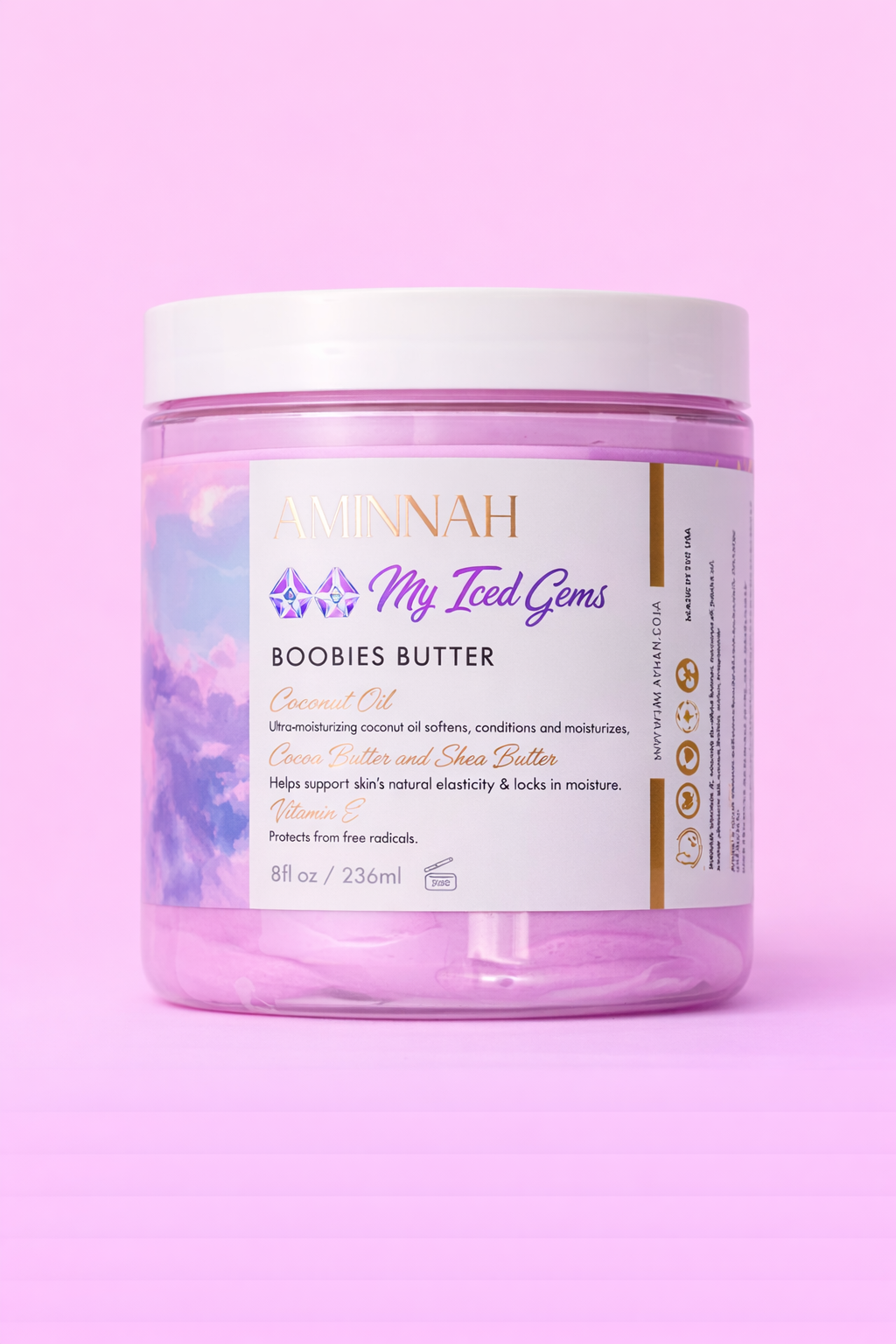 Jar of Raspberry Vanilla boob butter with the label facing forward on pale pink.