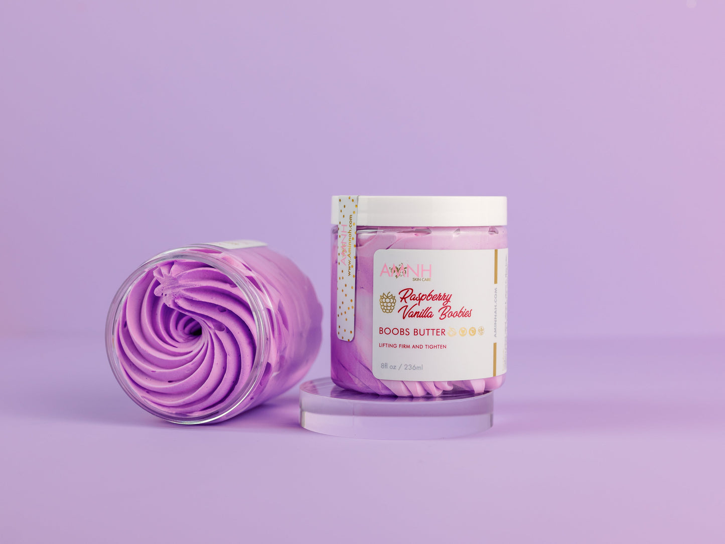 Two jars standing side by side on a lilac background.