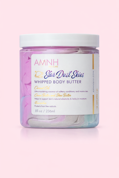 Jar of Star Dust Skies body butter with the label facing forward on pale pink.