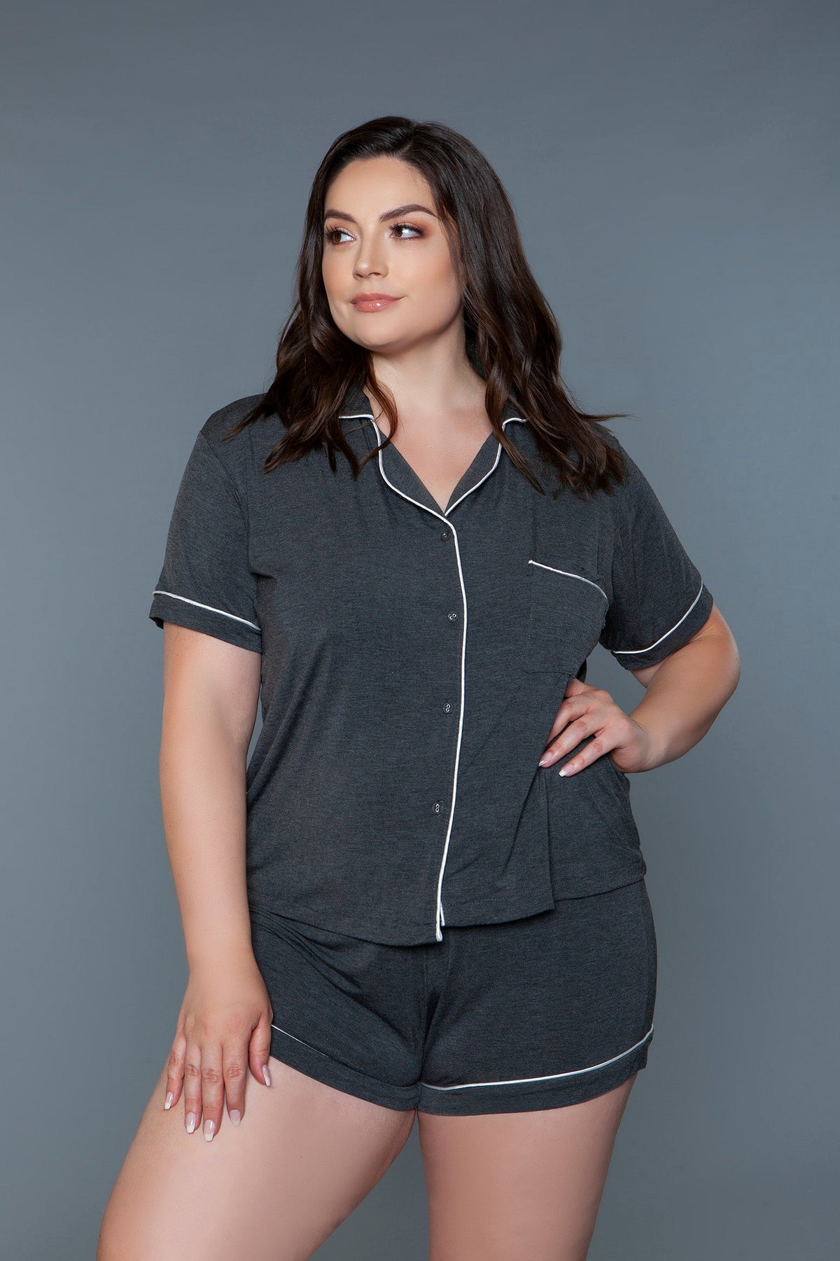 Button down knit pajama set in charcoal heather with white piping, front view of the top and shorts
