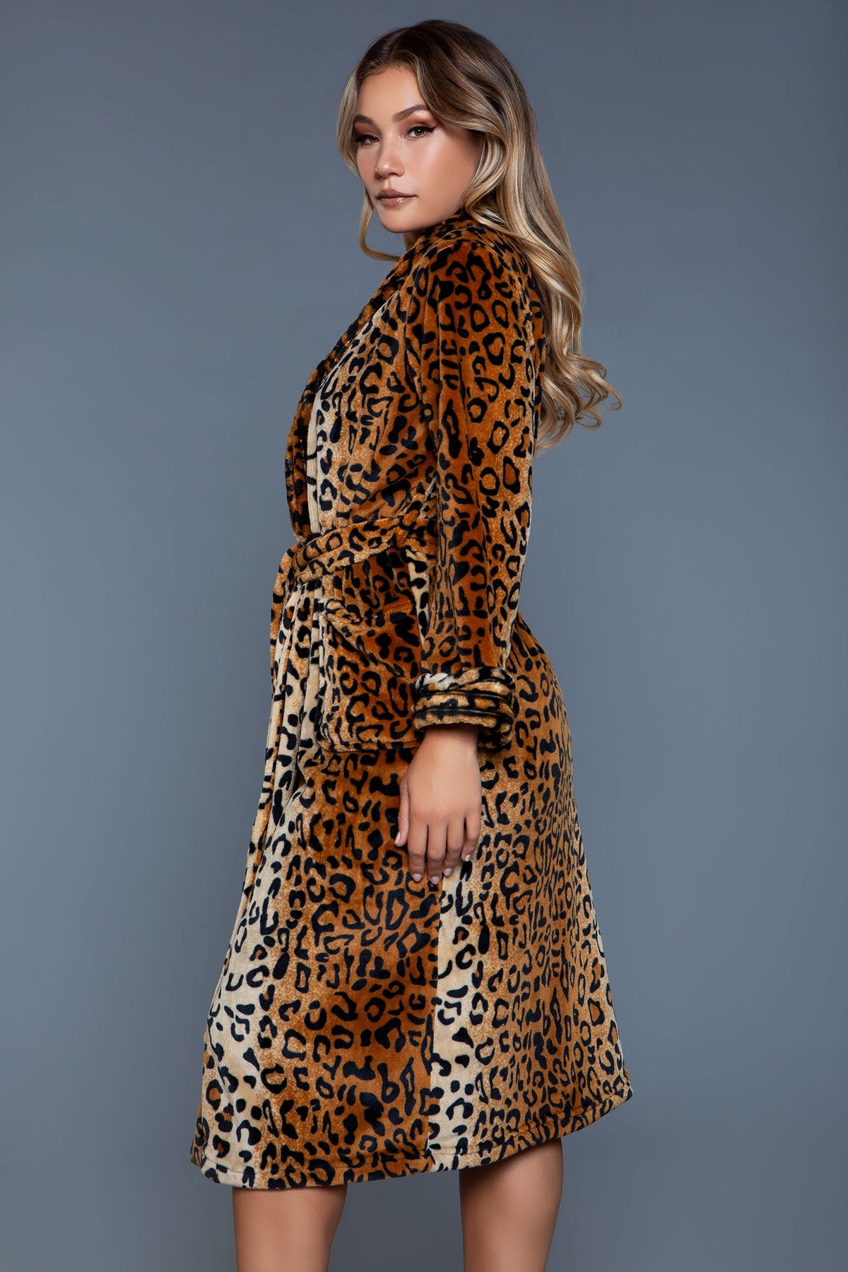 Leopard print plush robe, side view showing the long sleeves, belt and midi length