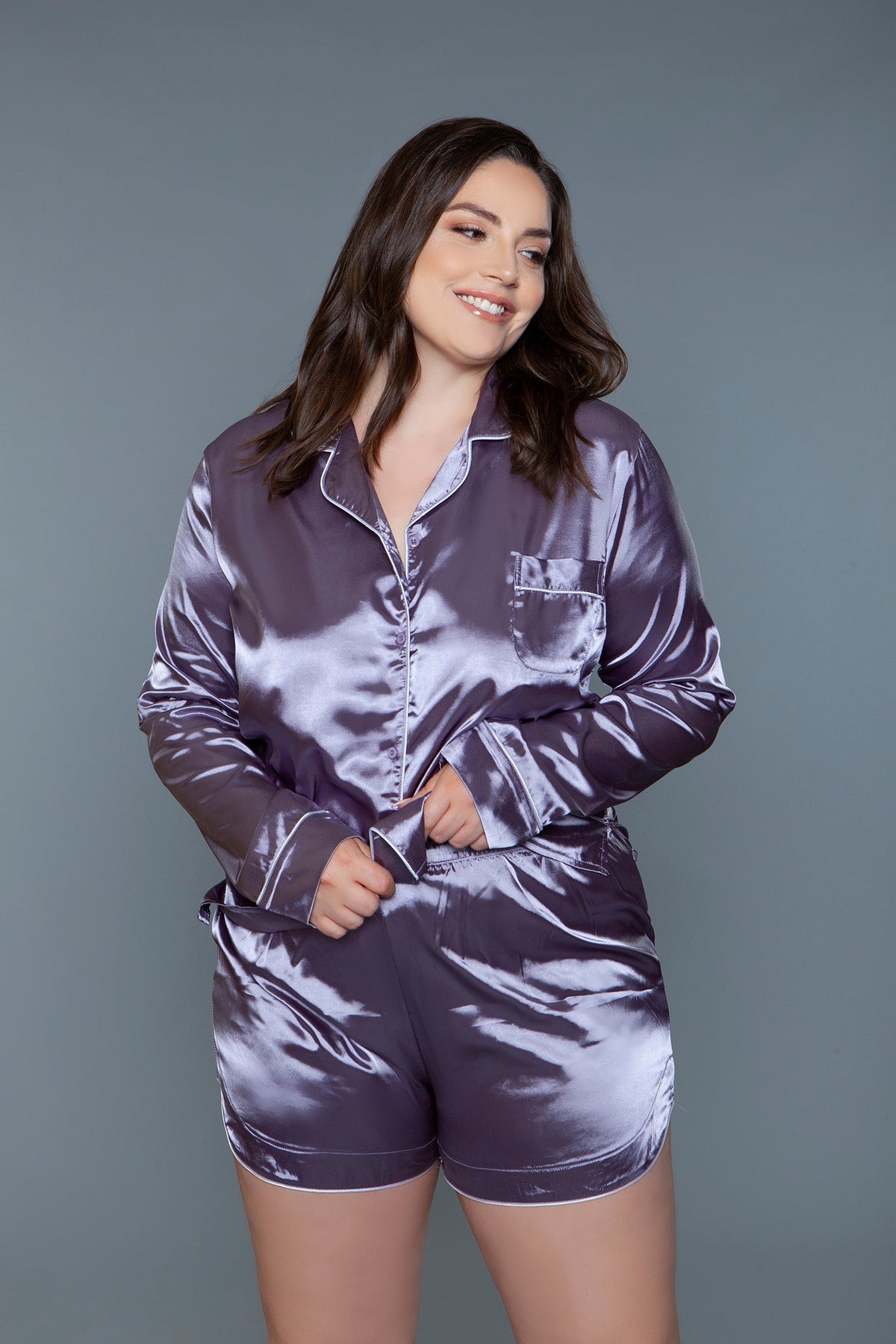Plus size satin pajama set in lilac, front view of the long sleeve button-down top and shorts