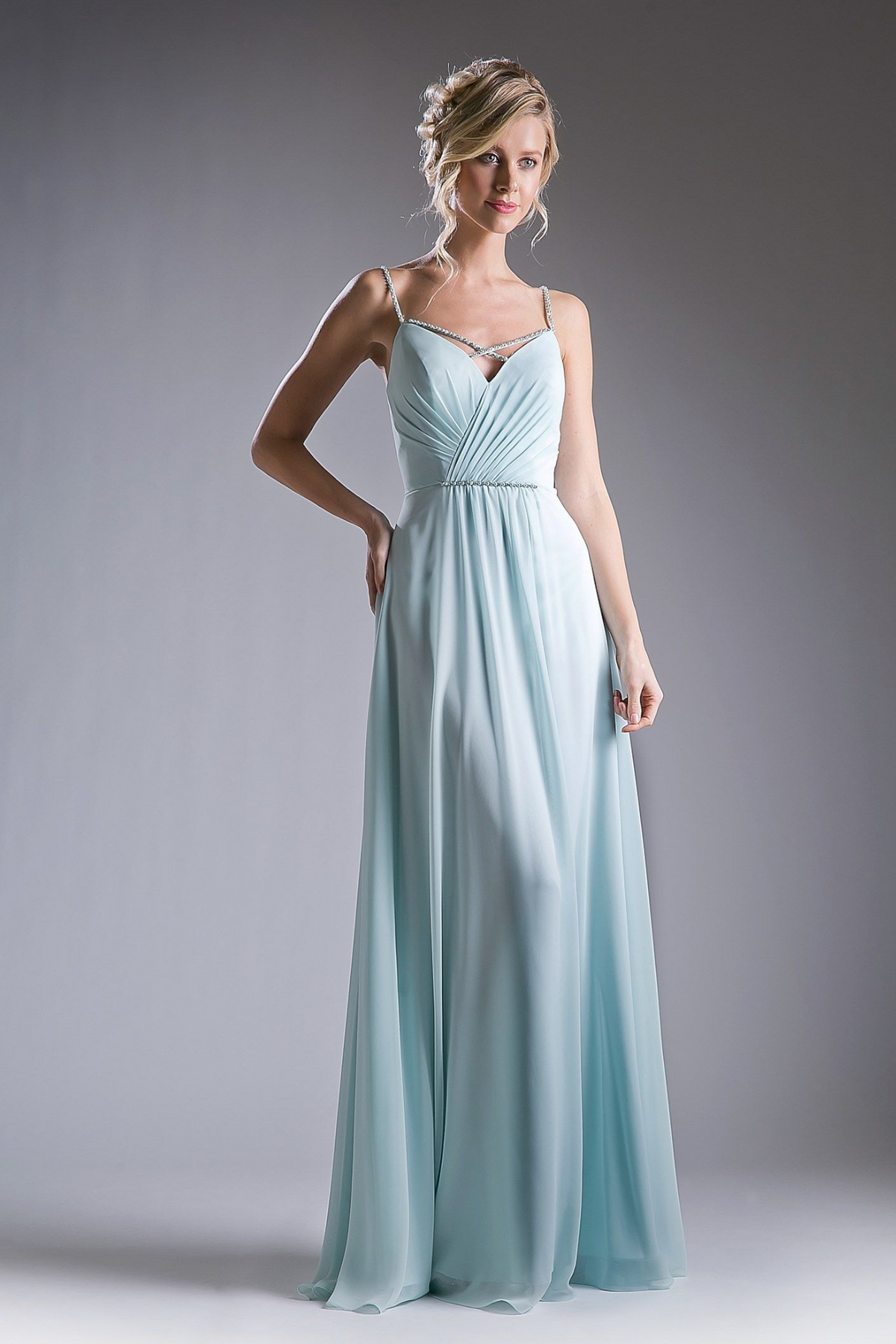 A-line evening gown with a ruched V-neck bodice and slender crisscross straps.