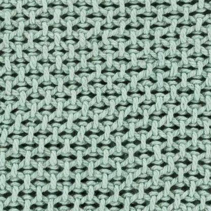 Close-up of the aqua green knit stitch on the cotton throw blanket