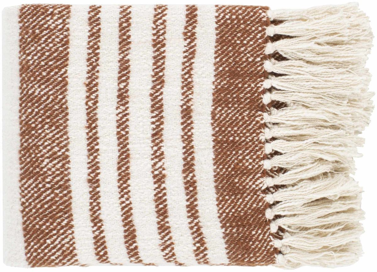 Close view of the cream throw blanket with rust stripes in a twill weave and cream fringe at the end