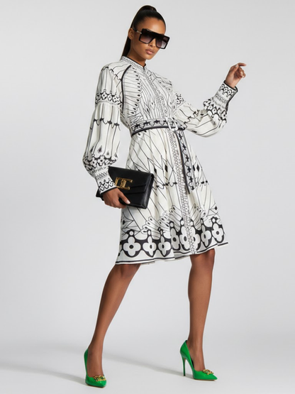 BYMANYC New York midi dress with a geometric butterfly print, puff sleeves and a belted waist.
