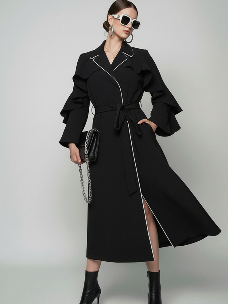 Ruffle long coat by BYMANYC New York, close view of the ruffle and the contrast piping.