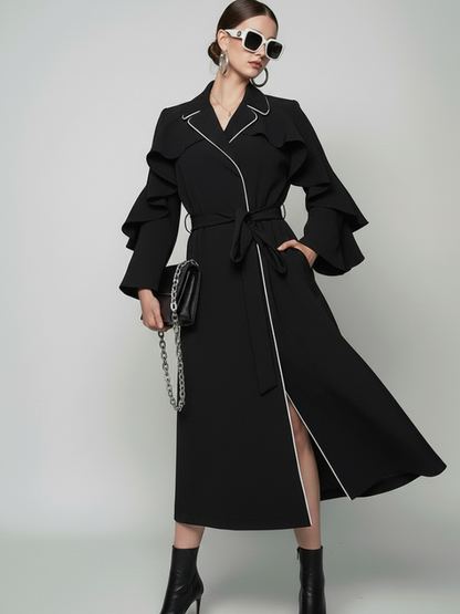 Ruffle long coat by BYMANYC New York, close view of the ruffle and the contrast piping.