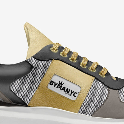 Gold vegan sport sneaker by BYMANYC New York with a lace fastening and a lightweight white sole.